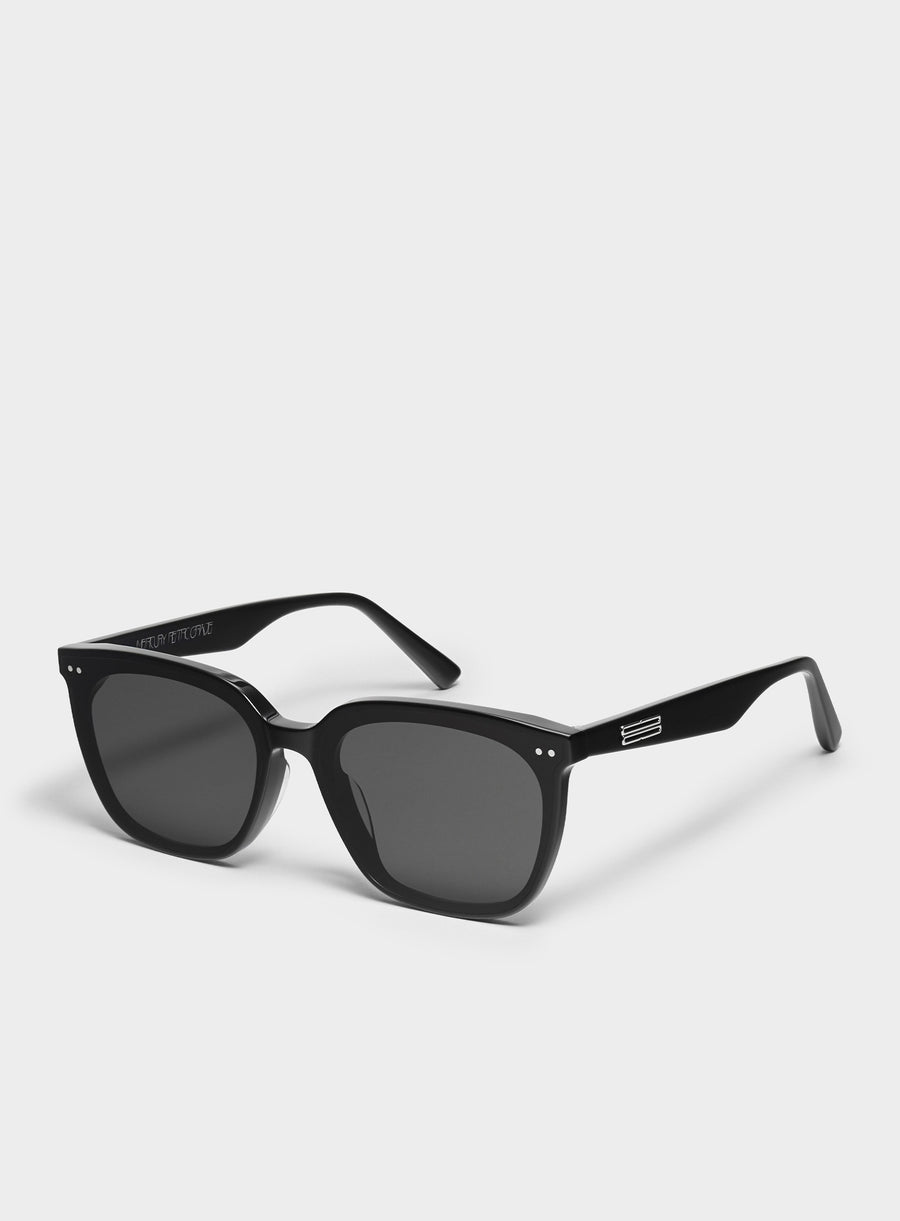 Artist in black Korean Fashion Sunglasses from the Burr Puzzle Collection by Mercury Retrograde