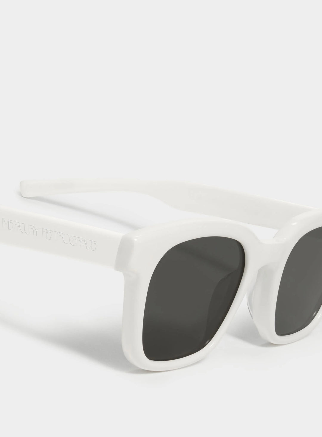 Close-up of Bubblegum square Sunglasses lenses, stylish eyewear by Mercury Retrograde Daydream Collection 