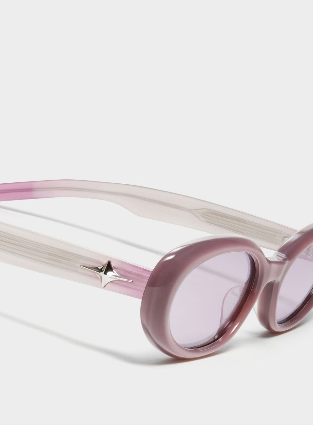 Close-up of Crux in purple round Sunglasses lenses, high-quality eyewear by Mercury Retrograde Galaxy Collection 