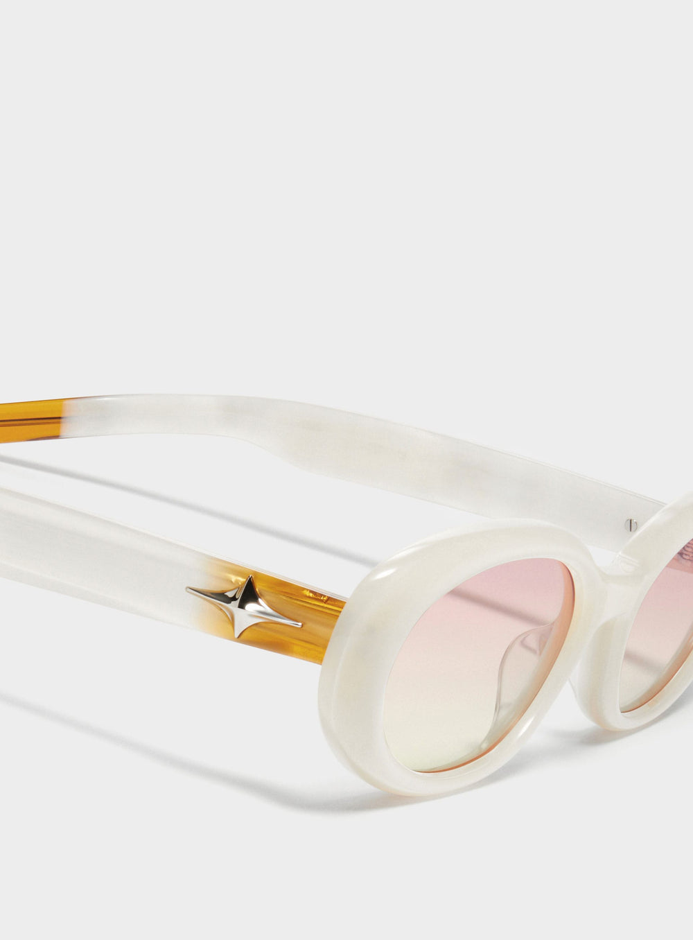 Close-up of Crux in white round Sunglasses lenses, high-quality eyewear by Mercury Retrograde Galaxy Collection 