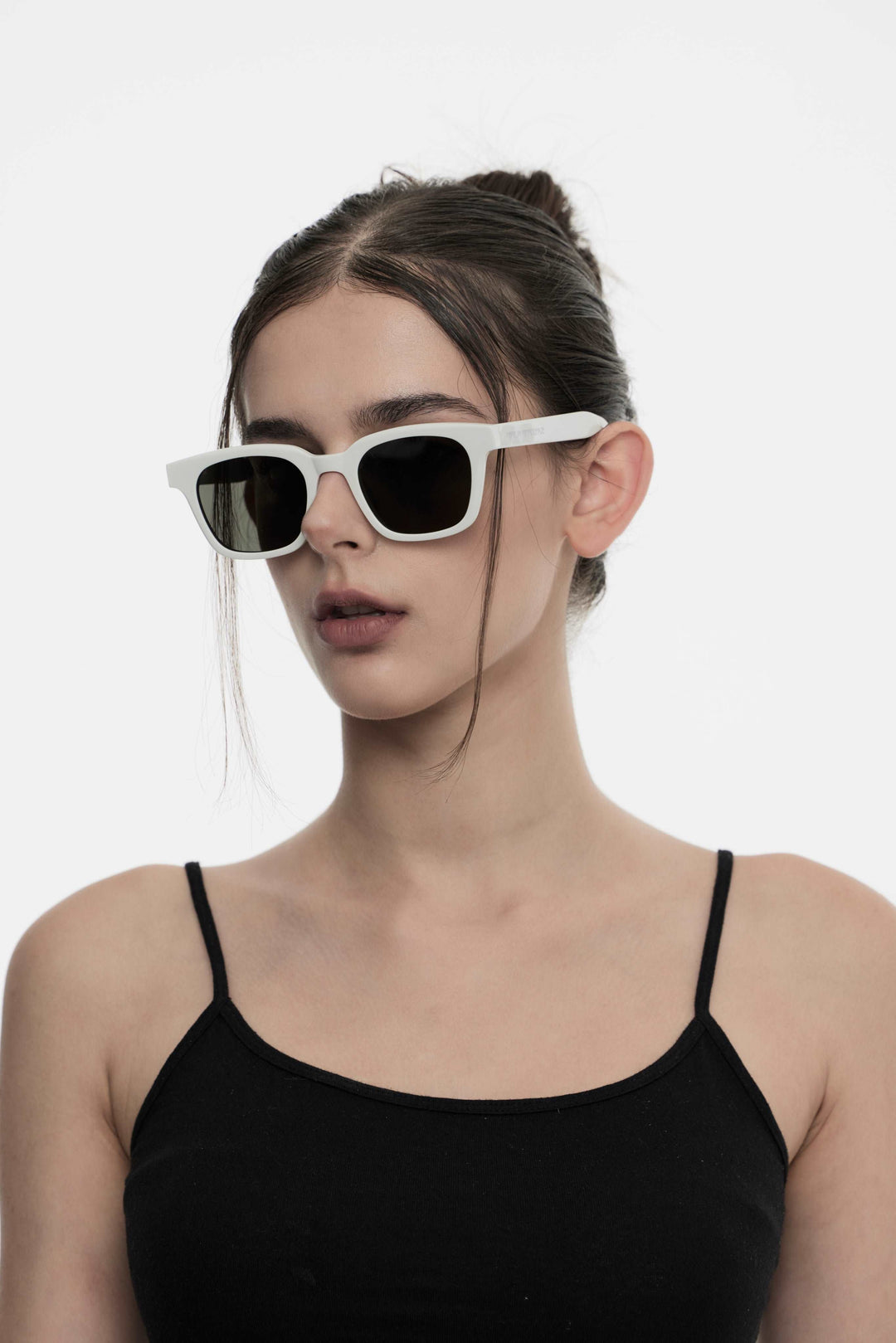 Side profile of model wearing stylish Bubblegum in white square Sunglasses from Mercury Retrograde Daydream Collection 