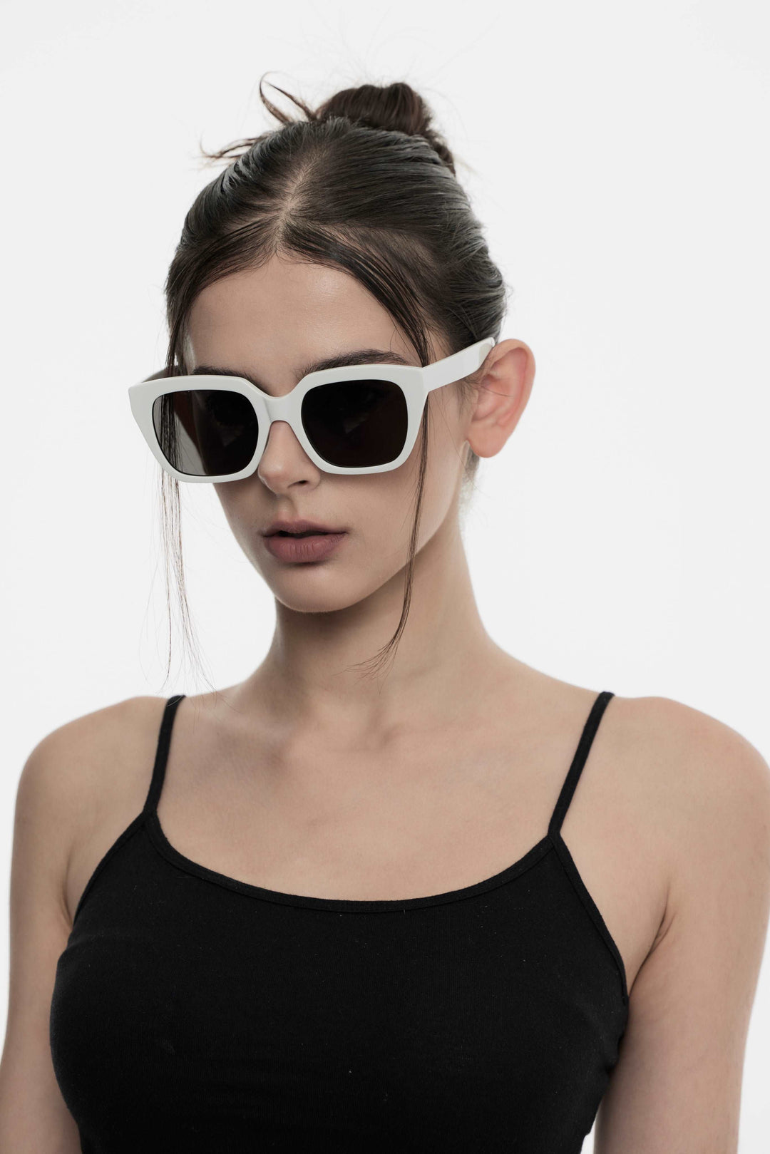 Model wearing Muse in pink square Designer Sunglasses with UV protection from Mercury Retrograde Daydream Collection 