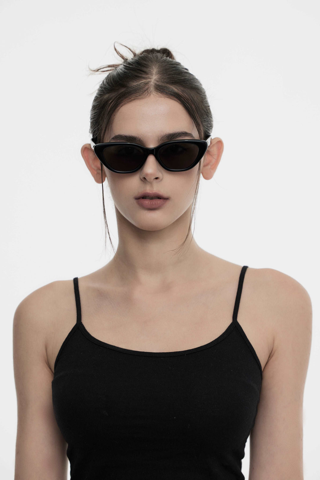 Female Model of her front face wearing Virgo in black cat-eye trendy sunglasses from Mercury Retrograde Galaxy Collection 