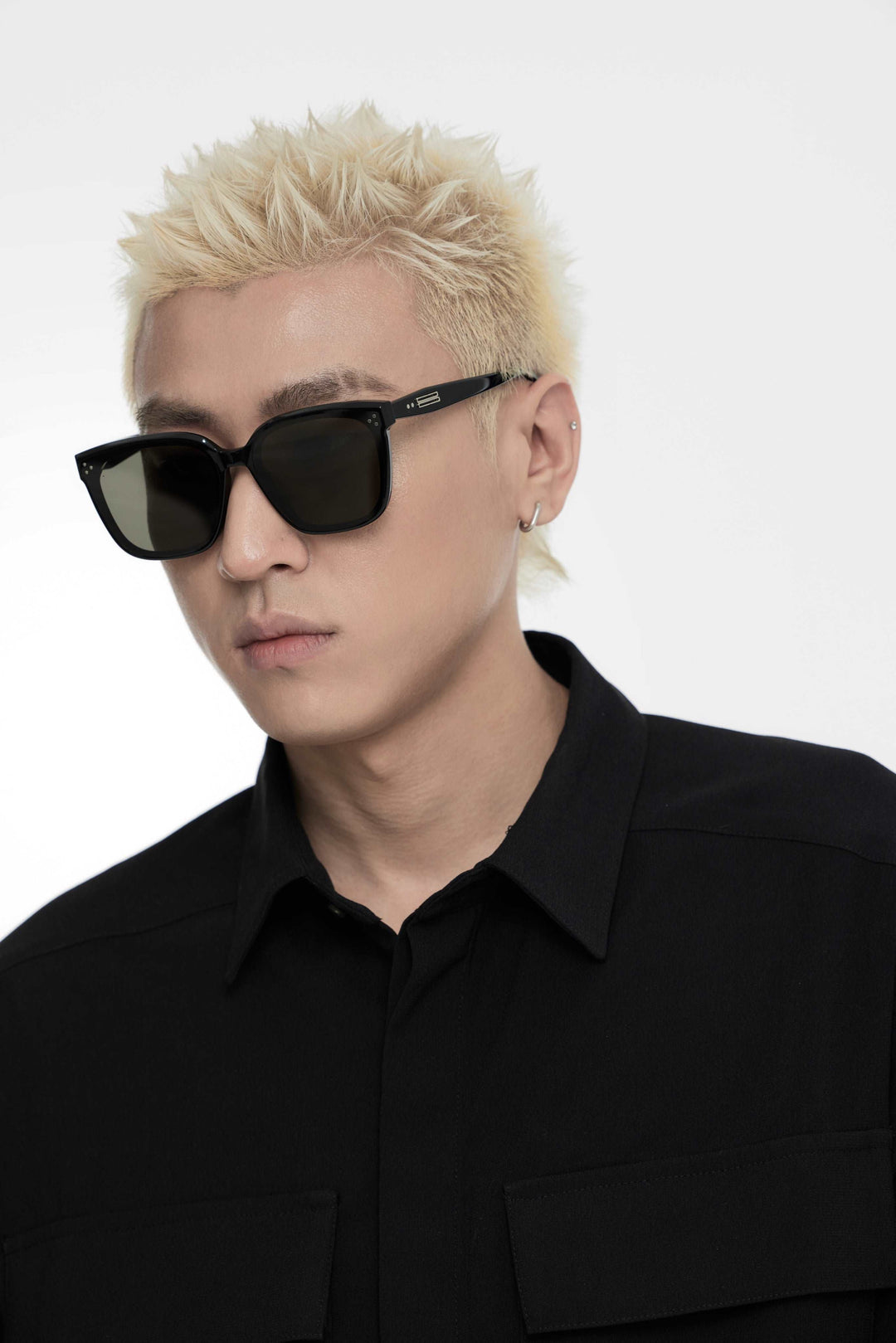 Side profile of model wearing stylish Indulge in black square Sunglasses from Mercury Retrograde Burr Puzzle Collection 