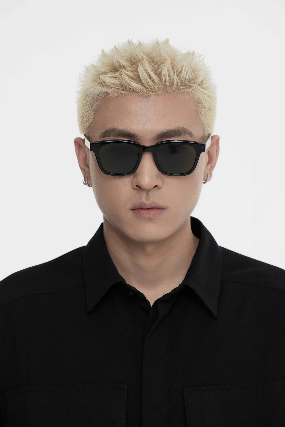 Male Model of his front face wearing Bubblegum in black sqaure High-quality sunglasses from Mercury Retrograde Daydream Collection 