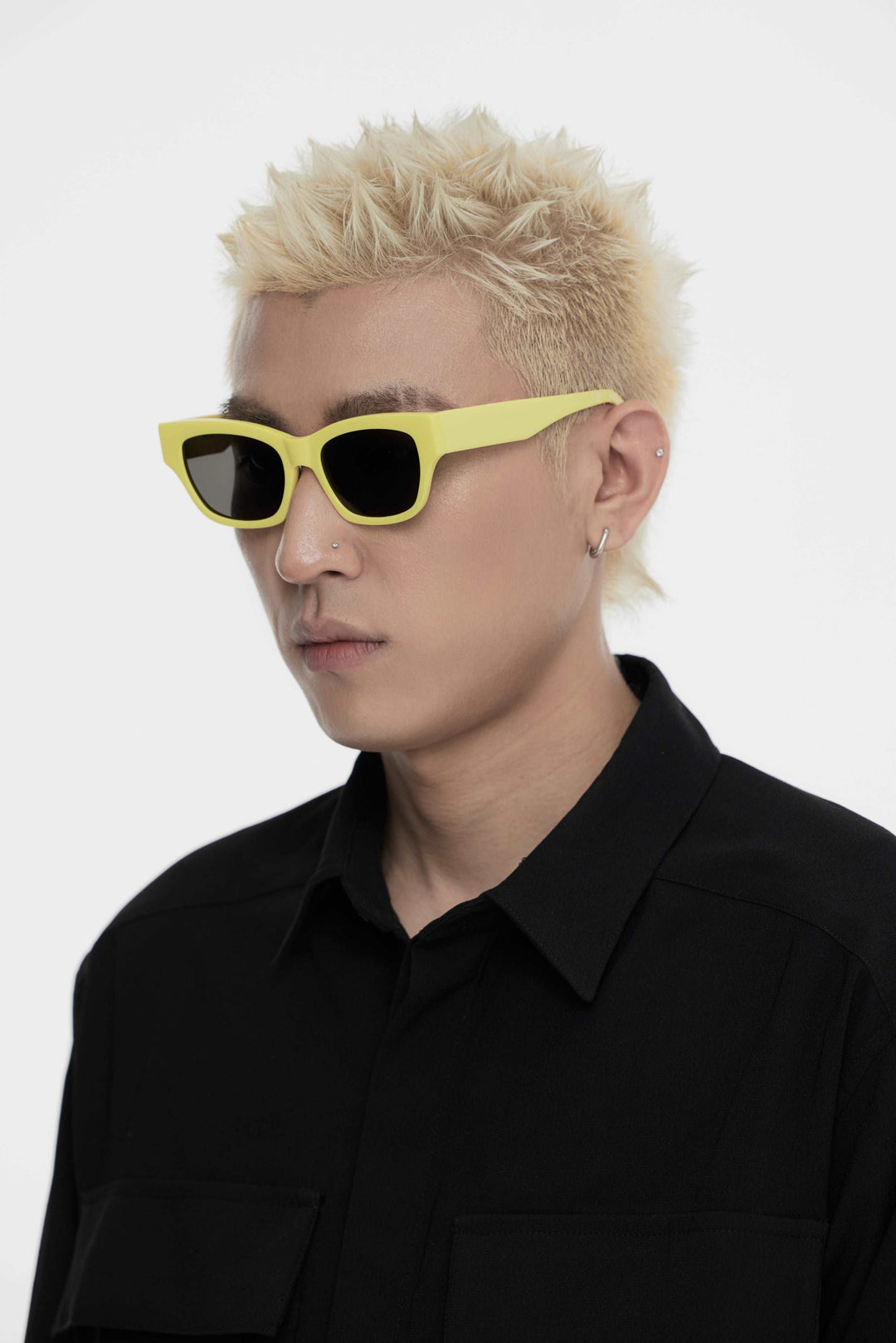 Model showcasing side view of Lust Korean Fashion Muse in yellow square Sunglasses from Mercury Retrograde's Daydream Collection