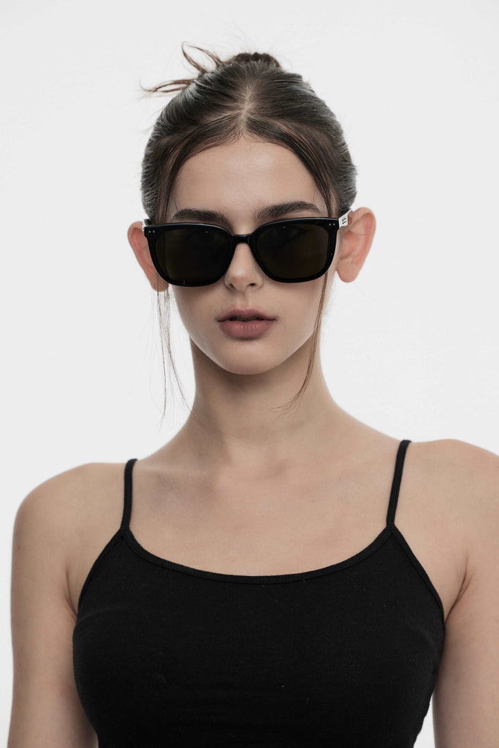 Model wearing Artist Designer Sunglasses from Burr Puzzle Mercury Retrograde