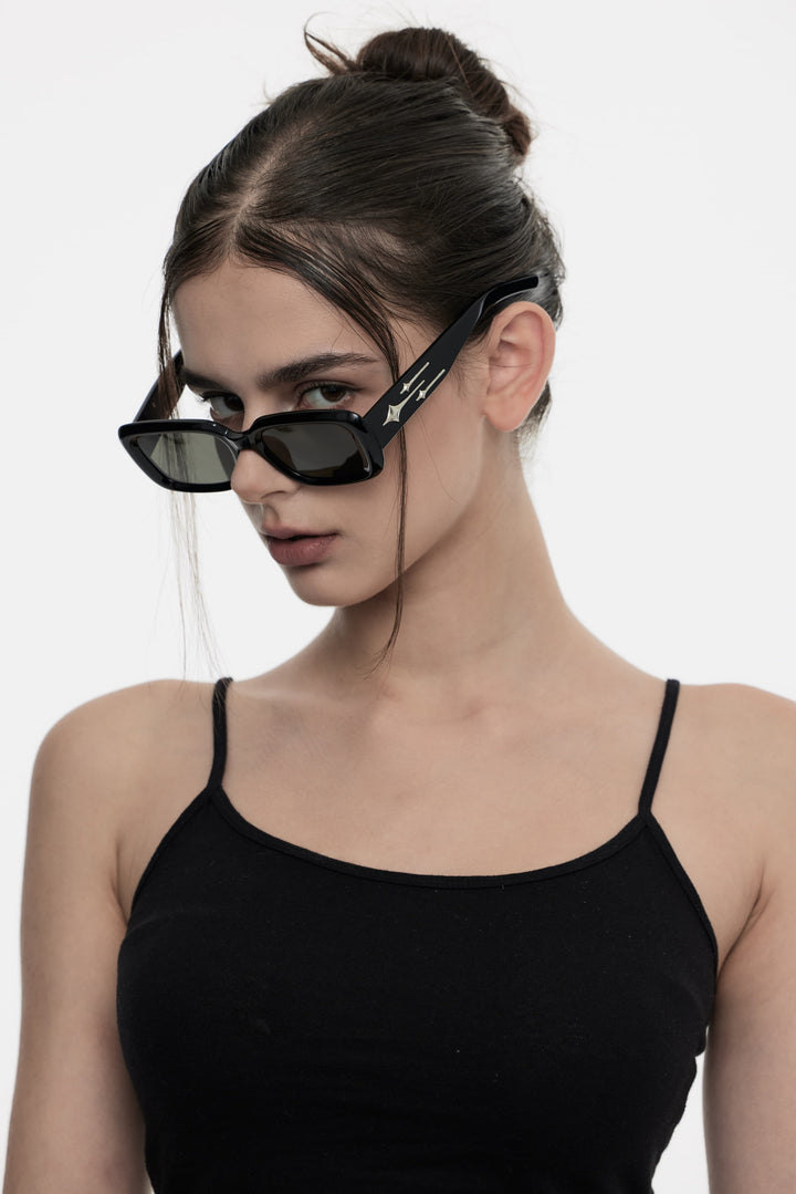 Model of her side face looking down wearing Sextans in black square Korean Fashion Sunglasses from Mercury Retrograde Galaxy Collection 