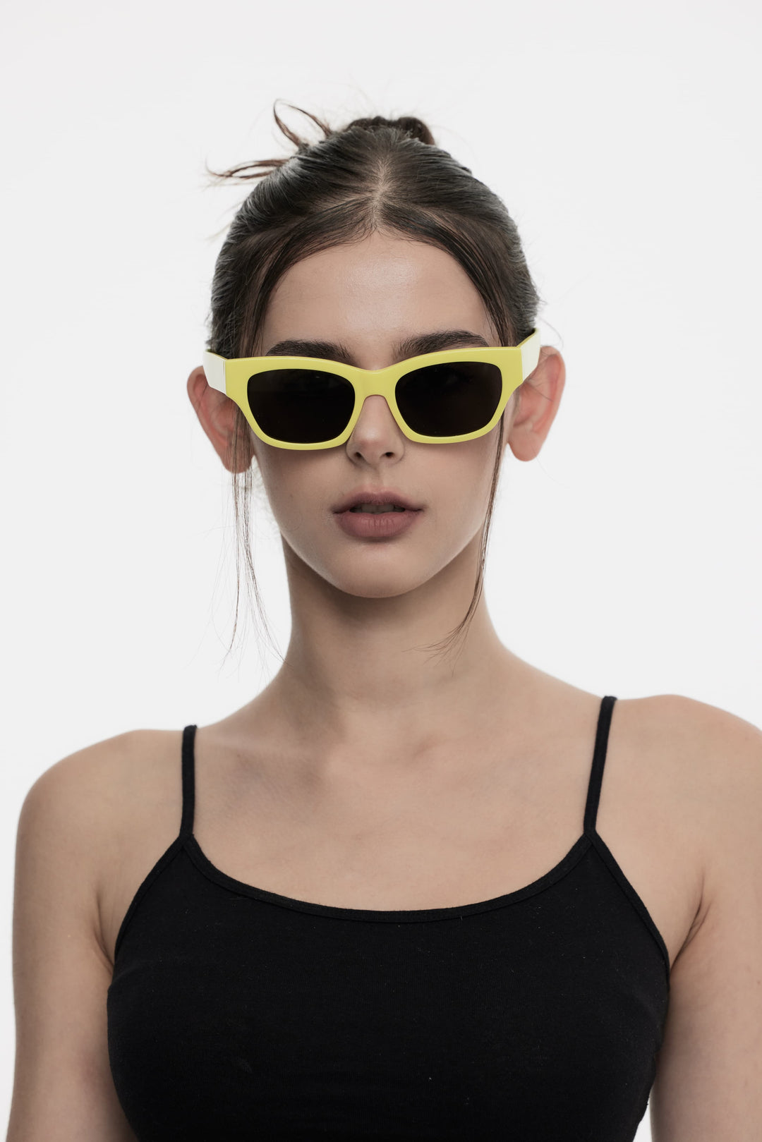 Female Model of her front face wearing Muse in pink yellow stylish sunglasses from Mercury Retrograde Daydream Collection 