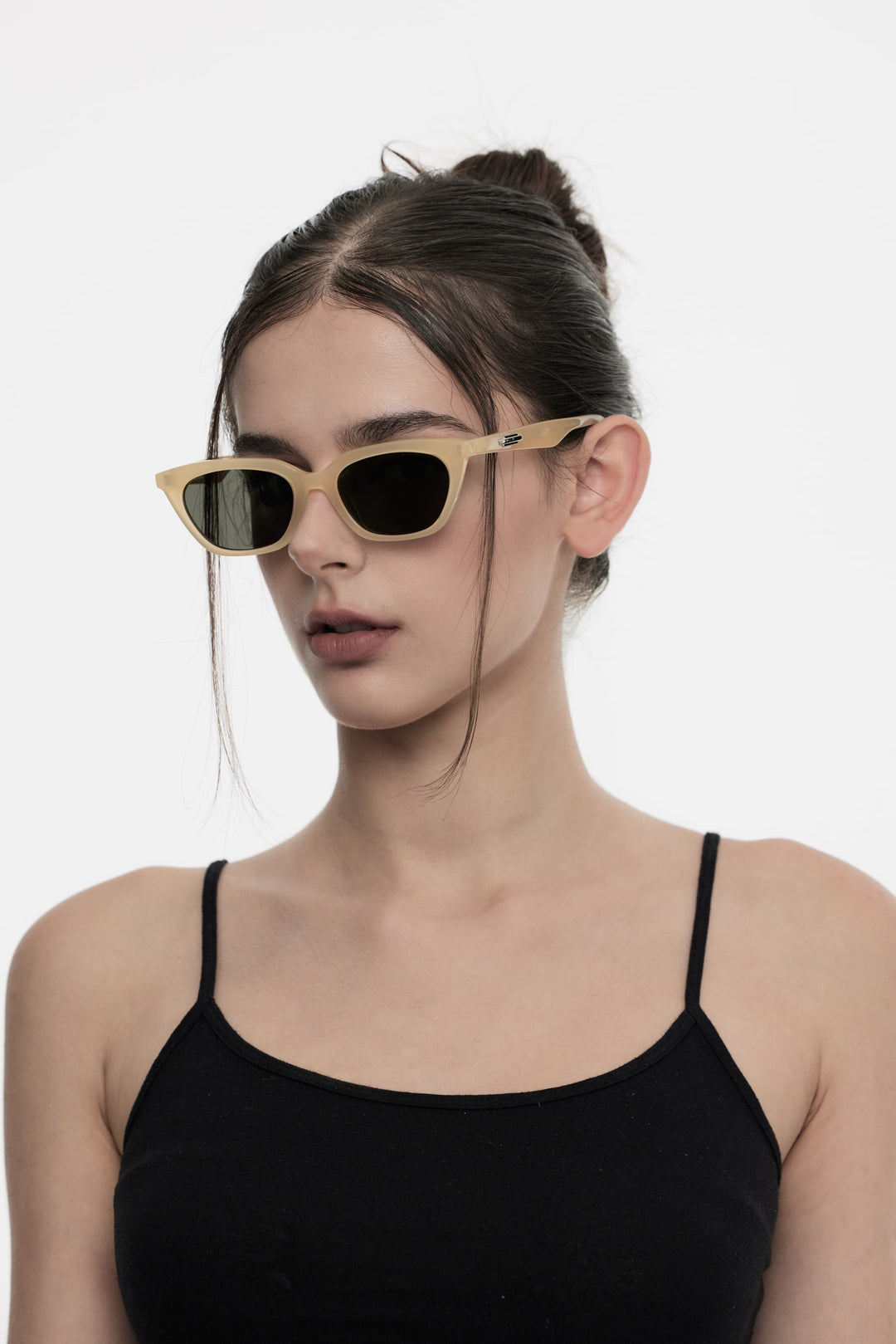 Model wearing Lust in yellow cat-eye Designer Sunglasses from Mercury Retrograde Burr Puzzle Collection 
