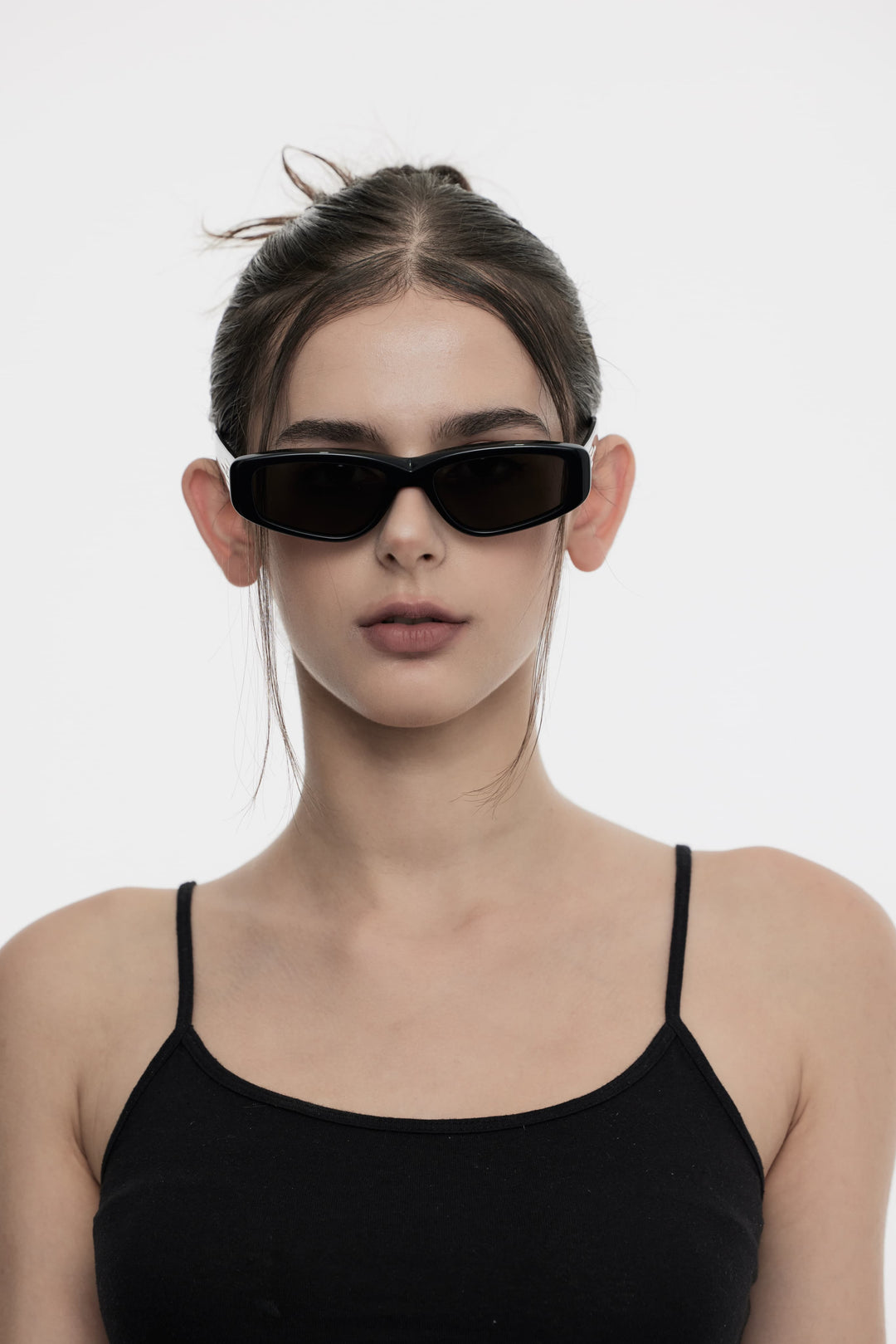 Female Model of her front face wearing Hydrus in black square stylish sunglasses from Mercury Retrograde Galaxy Collection 