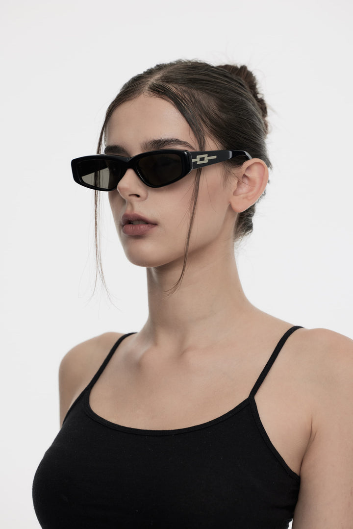 Side profile of model wearing trendy Hydrus in black square Sunglasses from Mercury Retrograde Galaxy Collection 