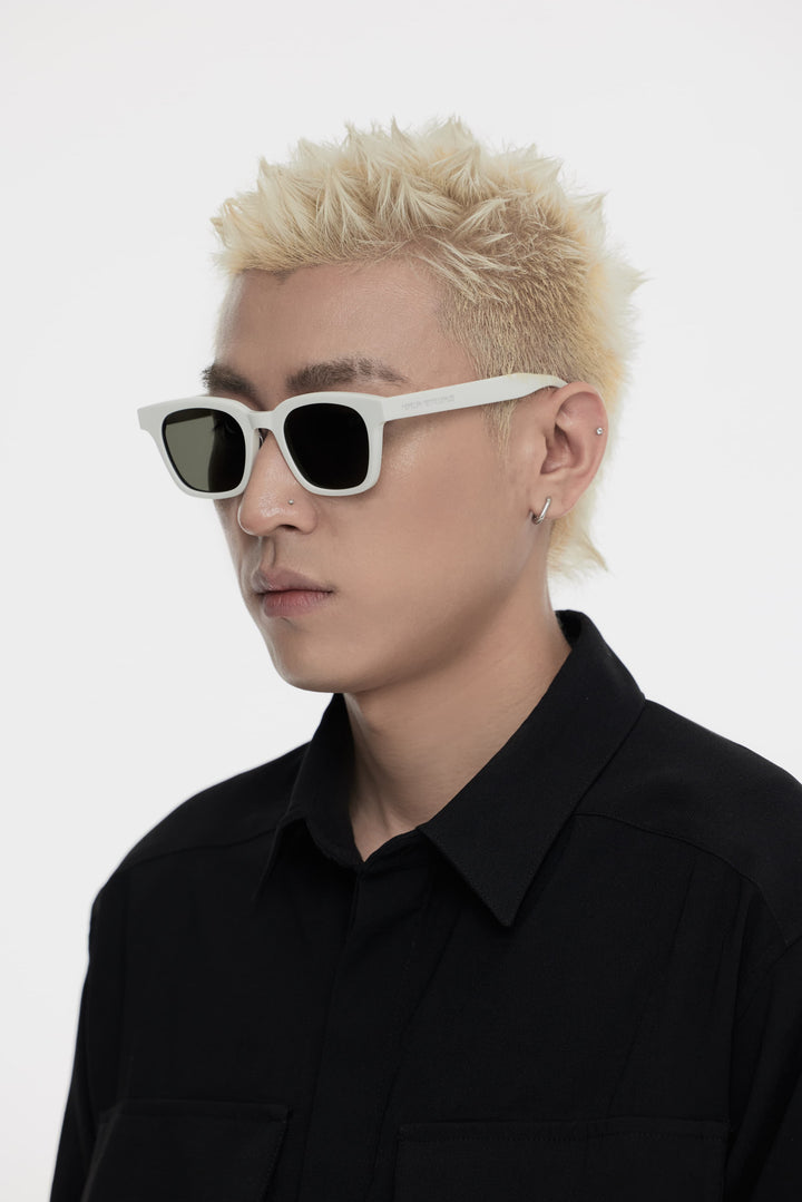 Model showcasing side view of Lust Korean Fashion Bubblegum in white square Sunglasses with UV protection from Mercury Retrograde's Daydream Collection