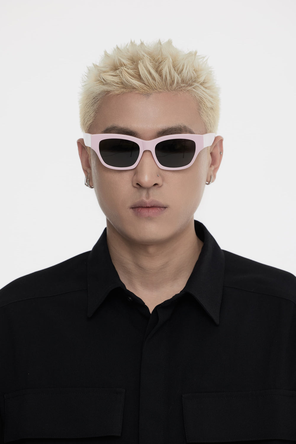Male Model of his front face wearing Muse in pink square High-quality sunglasses from Mercury Retrograde Daydream Collection 