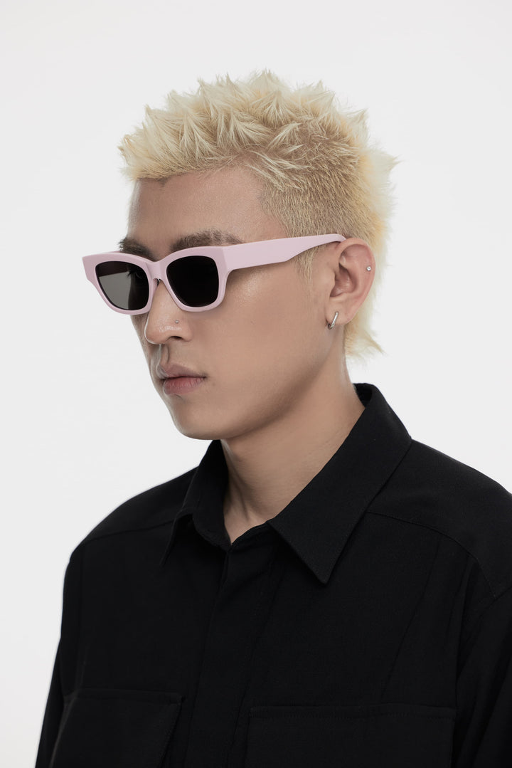 Model showcasing side view of Lust Korean Fashion Muse in pink square Sunglasses from Mercury Retrograde's Daydream Collection
