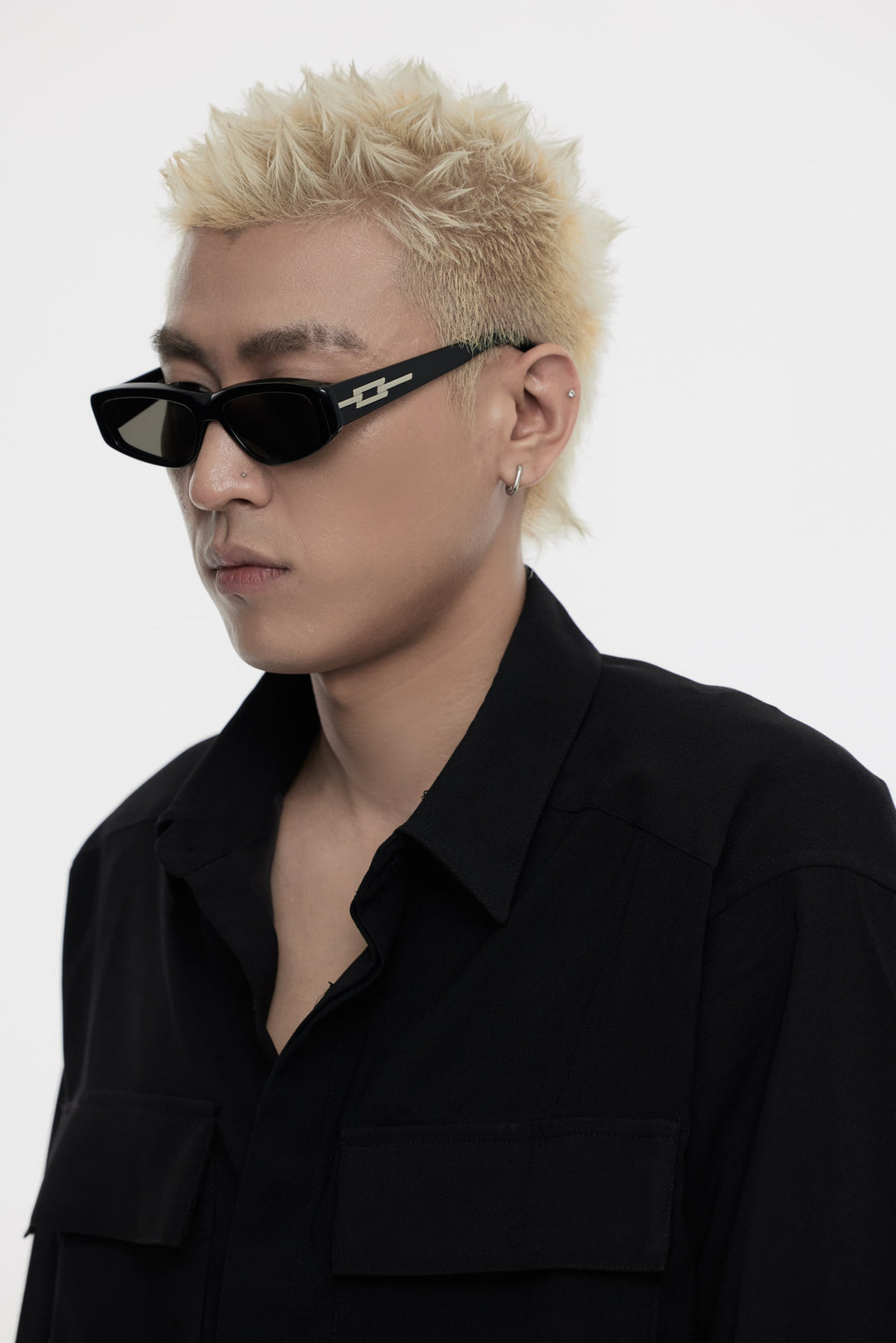 Model showcasing side view of Lust Korean Fashion Hydrus in black square Sunglasses from Mercury Retrograde's Galaxy Collection
