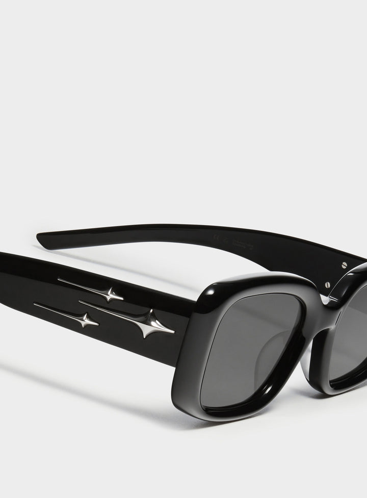 Close-up of Sextans in black square Sunglasses lenses, high-quality eyewear by Mercury Retrograde Galaxy Collection 