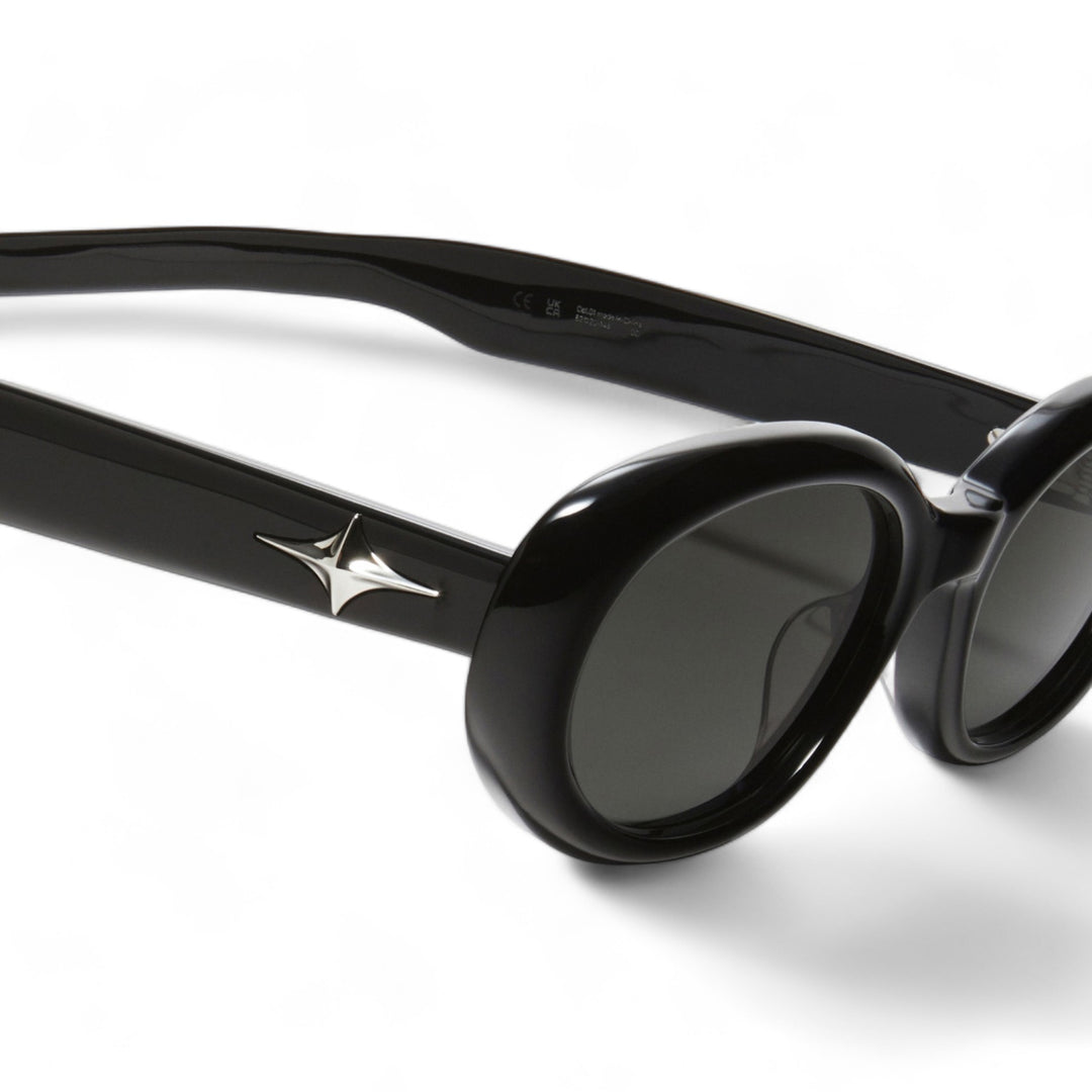 Close-up of Crux in black round Sunglasses lenses, high-quality eyewear by Mercury Retrograde Galaxy Collection