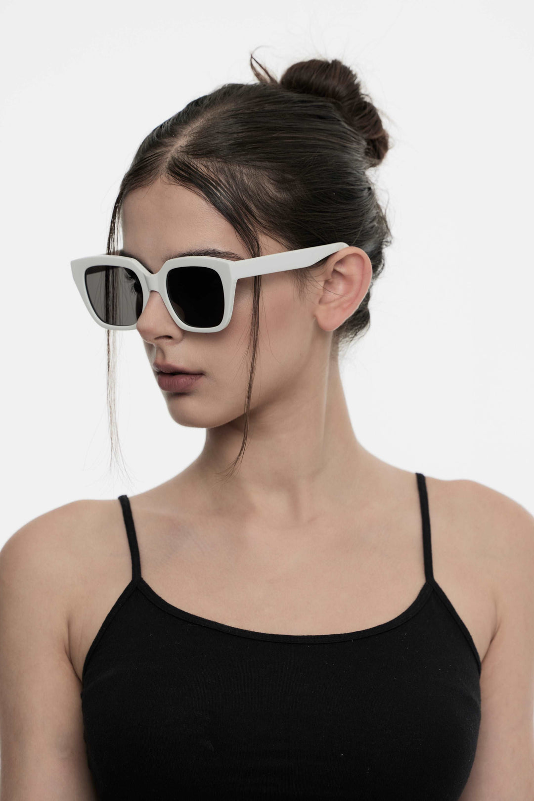 Model showcasing side view of Lust Korean Fashion Marshmallow in white square Sunglasses from Mercury Retrograde's Daydream Collection