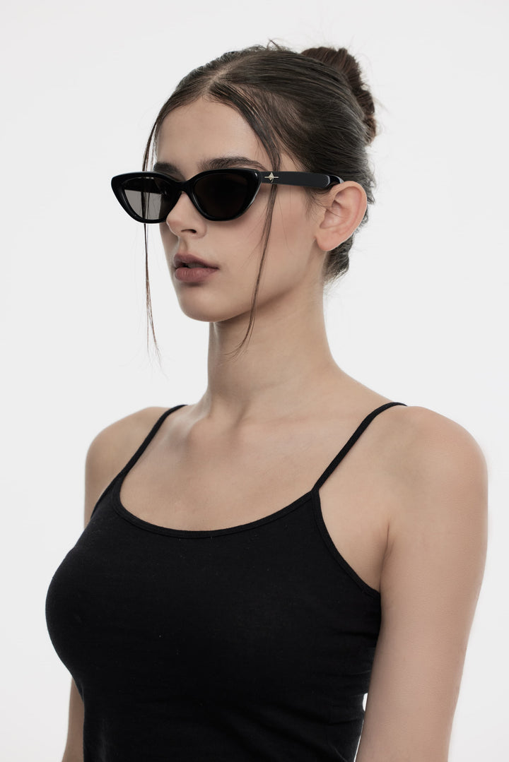 Side portrait of model illustrating the stylish design of Galaxy’s Virgo in black cat-eye Sunglasses by Mercury Retrograde