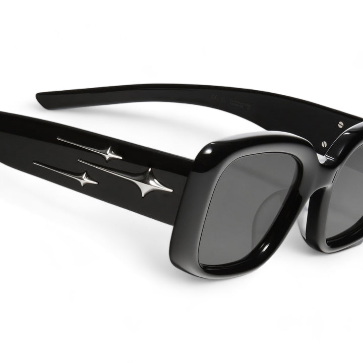 Close-up of Sextans in black square Sunglasses lenses, high-quality eyewear by Mercury Retrograde Galaxy Collection